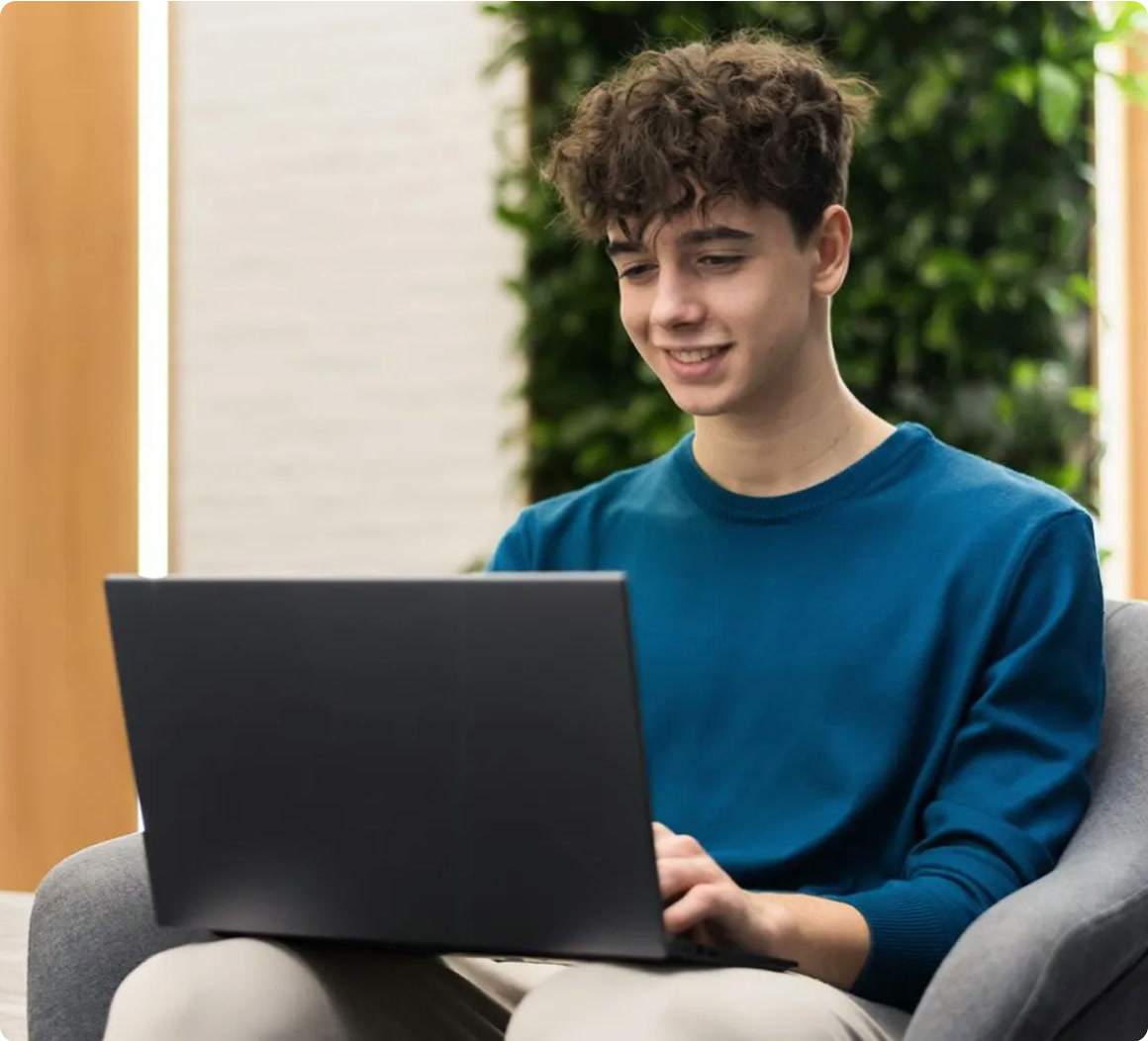 Learner working on a laptop